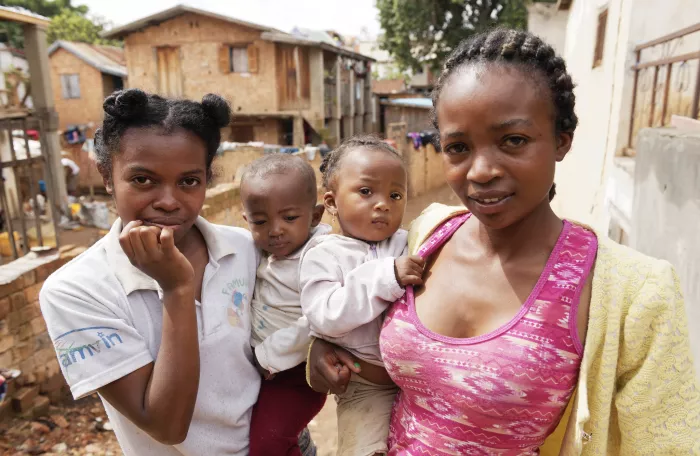 2 women holding their babies_Madagascar