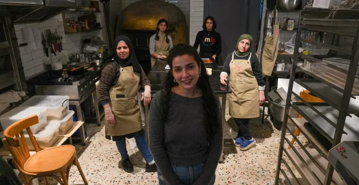 women entrepreneurs in Lebanon posing in their bakery