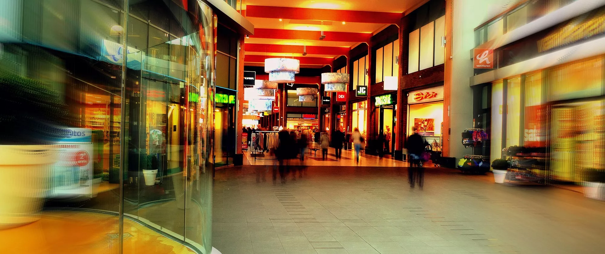 Inside picture of a mall with different shops