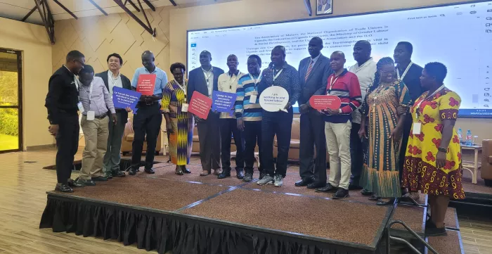 Delegates from Uganda, Malawi and Kenya pose for a picture together